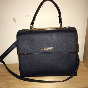 Structured navy and rose gold purse